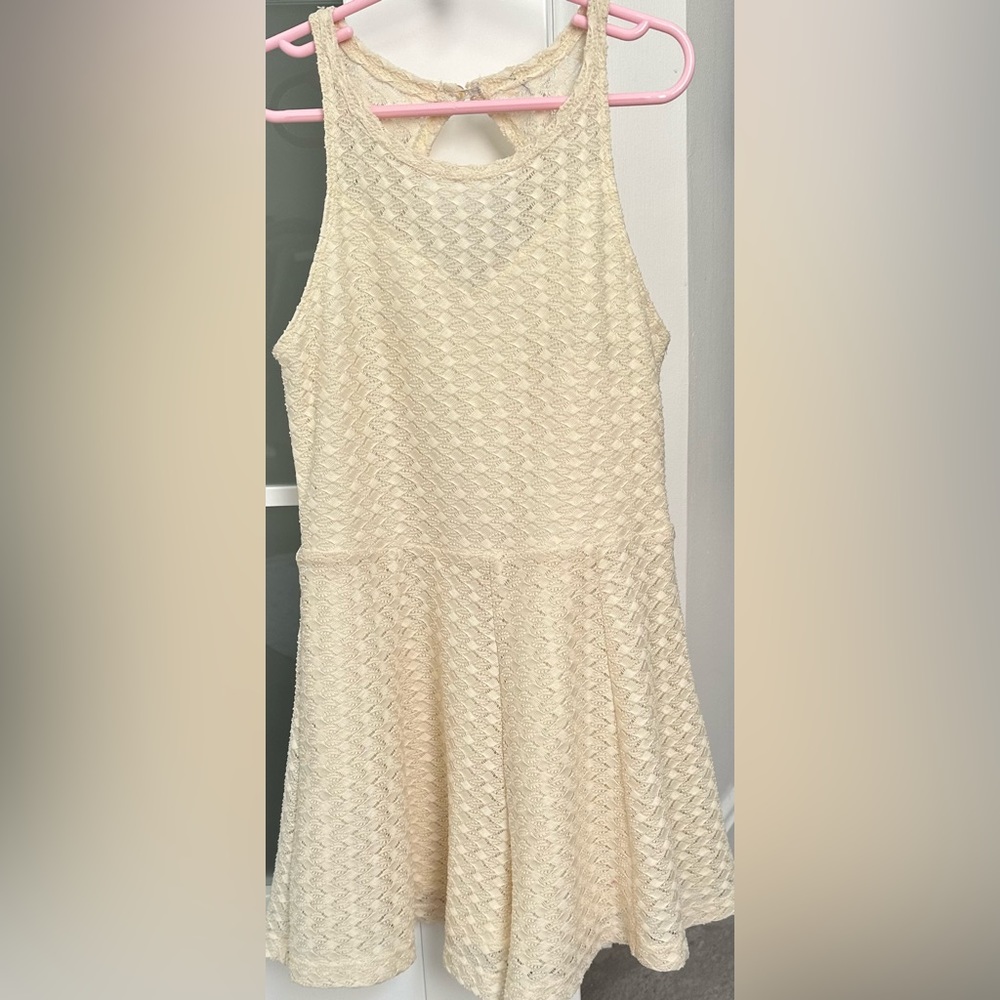 Yellow skater dress, crocheted material, girls size 12, excellent condition.
